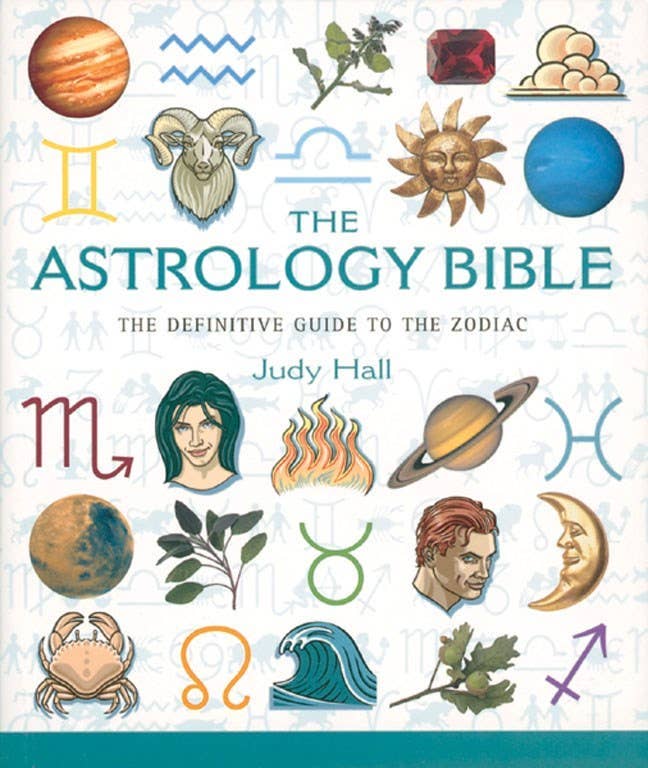 Book cover of 'The Astrology Bible' with astrological symbols and zodiac signs.