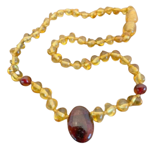  amber teething necklace on a white background