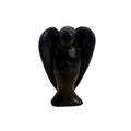A glossy black angel figurine with outstretched wings, displayed against a plain white background.