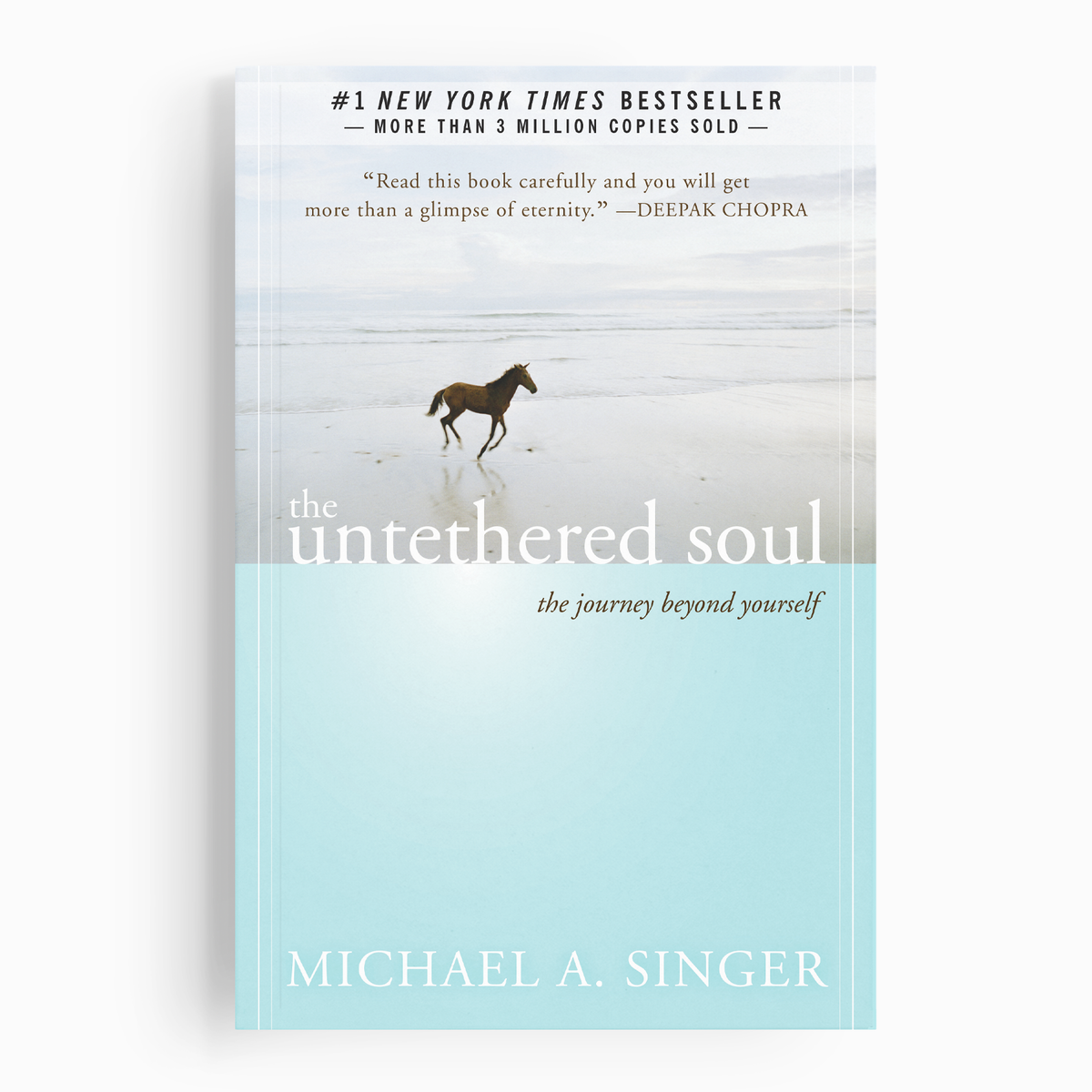 Book cover of 'The Untethered Soul' by Michael A. Singer with a horse on a beach.
