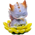 White dragon-like creature with orange horns on a yellow lotus flower against a white background