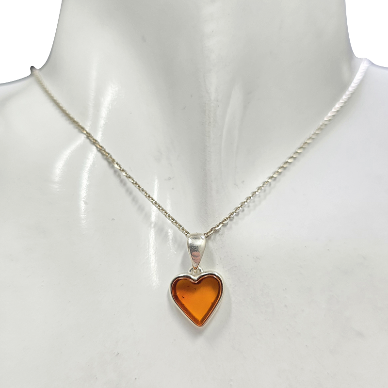 Amber Heart Pendant set in Sterling Silver on a chain