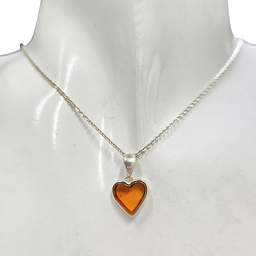 Amber Heart Pendant set in Sterling Silver on a chain