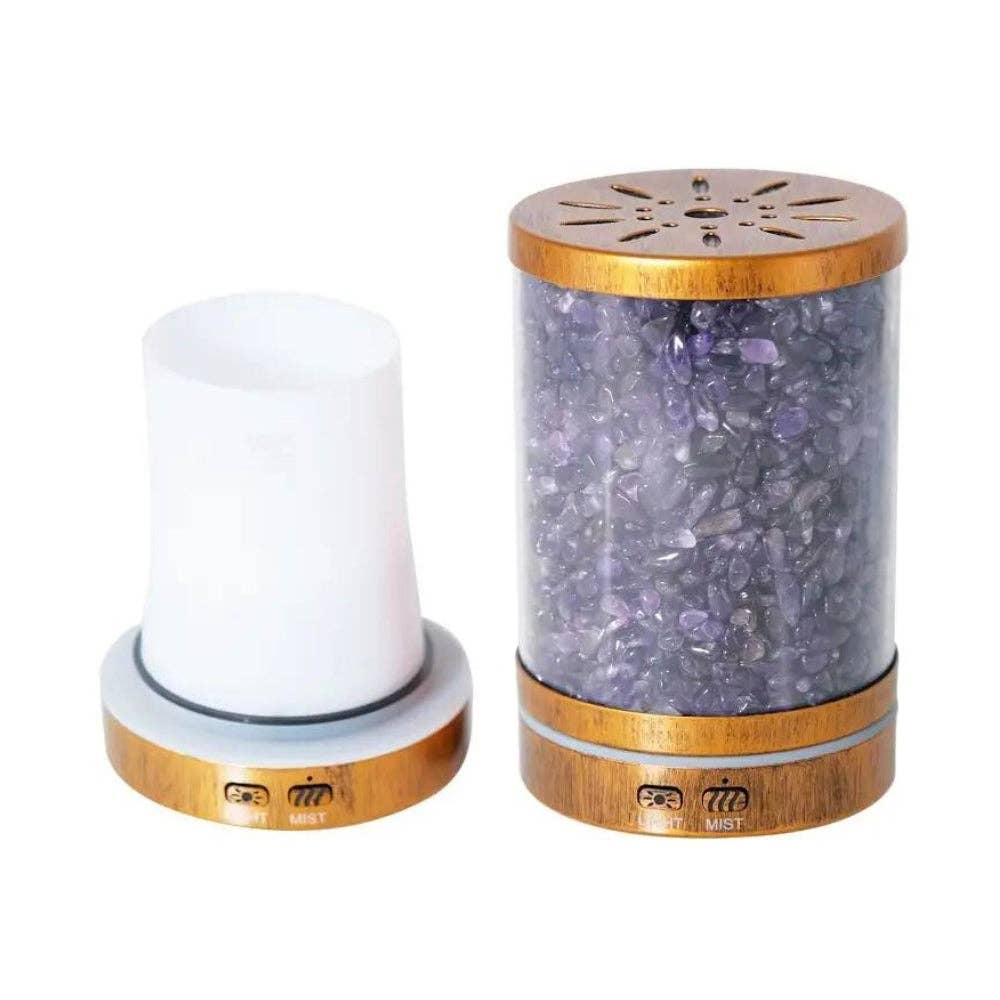 An amethyst diffuser filled with amethyst crystals background