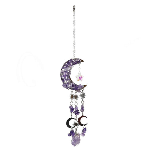 An amethyst crescent moon suncatcher ornament decorated with purple amethyst crystals, small metal moon phases, starbursts, and a dangling purple amethyst crystal bead, shown against a plain white background.