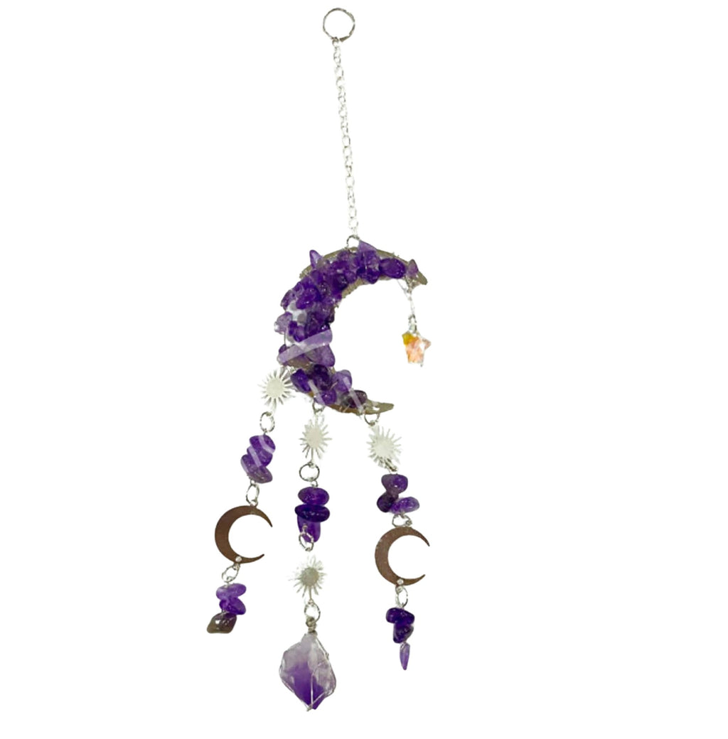 A hanging amethyst crystal suncatcher featuring purple amethyst stones, metal crescent moon charms,  and a silver chain with a top ring, shown against a plain white background.