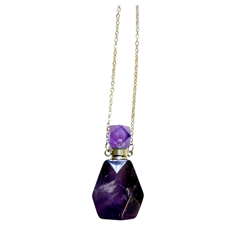 A purple amethyst crystal aromatherapy pendant.