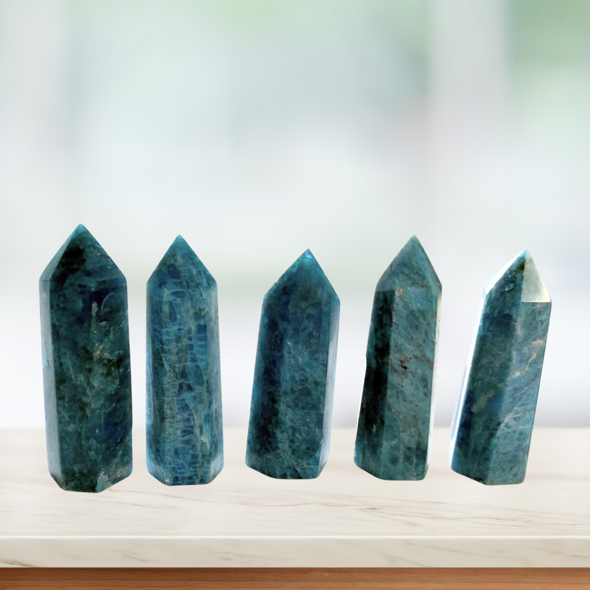 Five Blue Apatite Points in a window sill