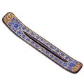 Hand-painted black incense holder with blue cornflowers and gold accents on a white background