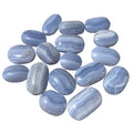 A group of polished blue agate tumbled stones with natural banding.
