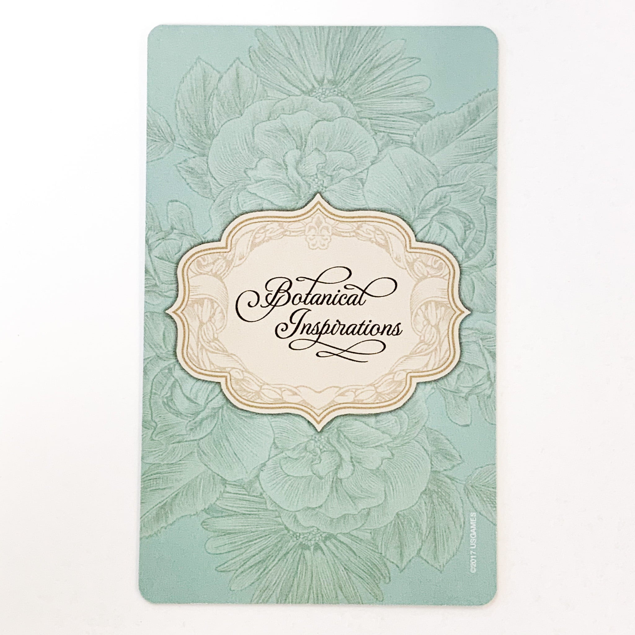 Book cover with floral design and 'Botanical Inspirations' text on a light blue background