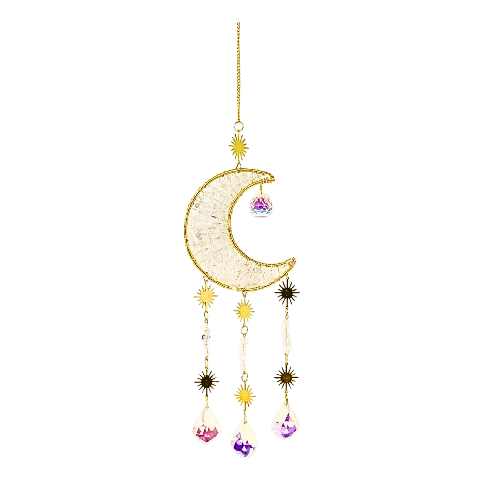 A gold crescent moon and star wind chime clear quartz ornament featuring clear quartz and glitter, and dangling crystal charms.