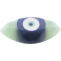 A single evil eye body soap with a blue outer ring, white center, and light blue pupil, set in a translucent pale green material, shown on a plain white background.