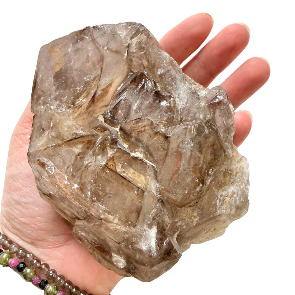 Extra large Elestial point on a hand for scale
