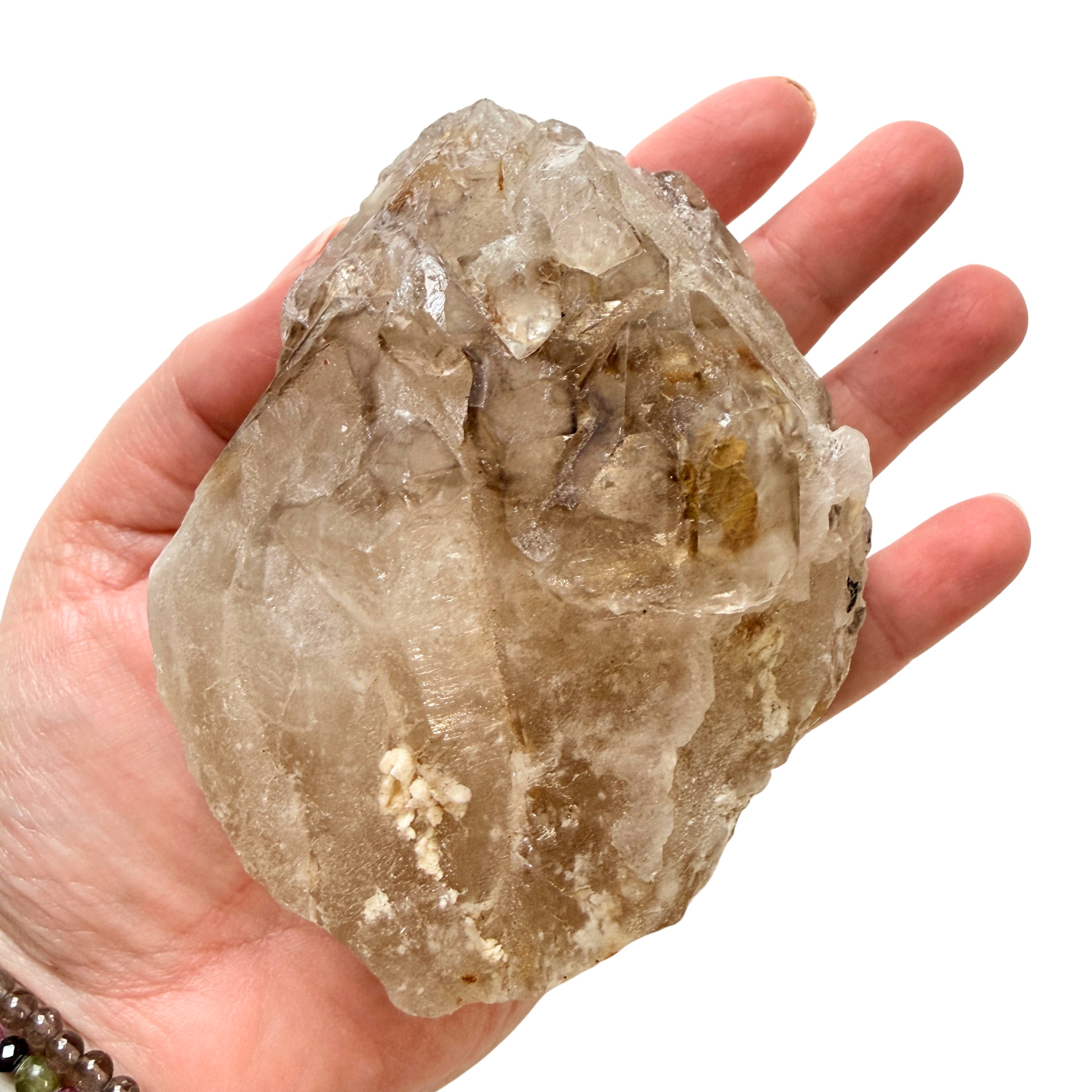 Extra large Elestial point on a hand for scale