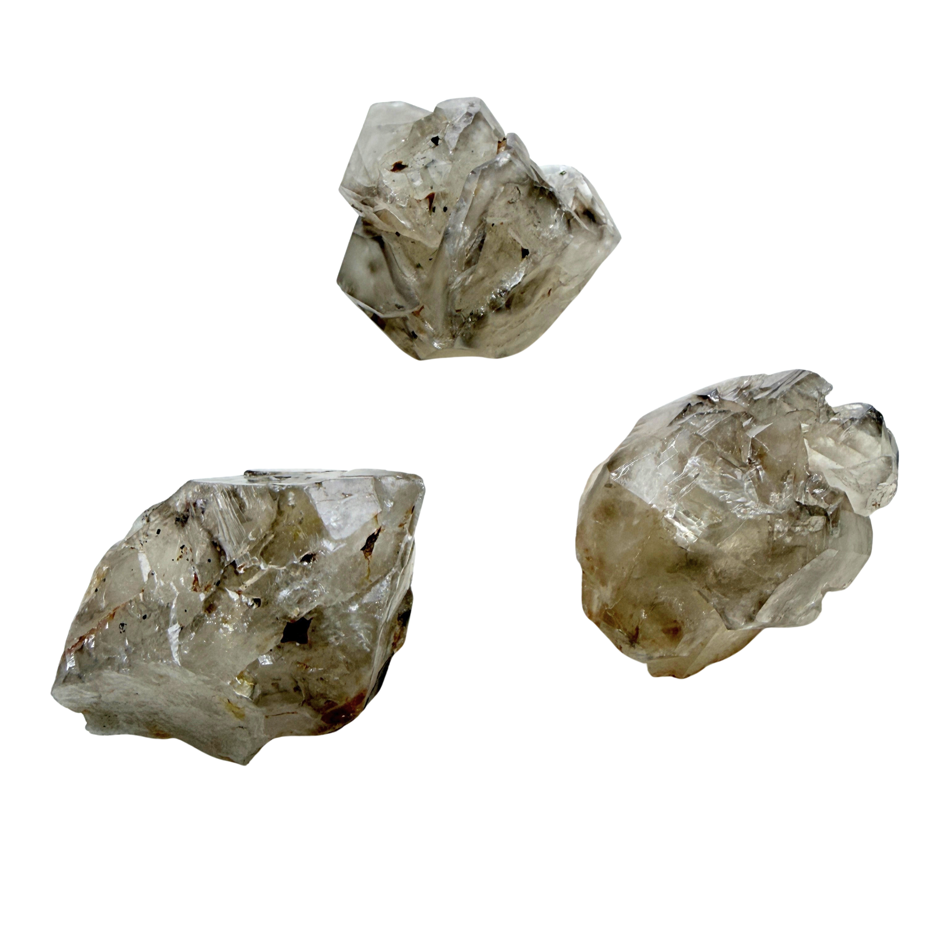 Three small Elestial points on a white background