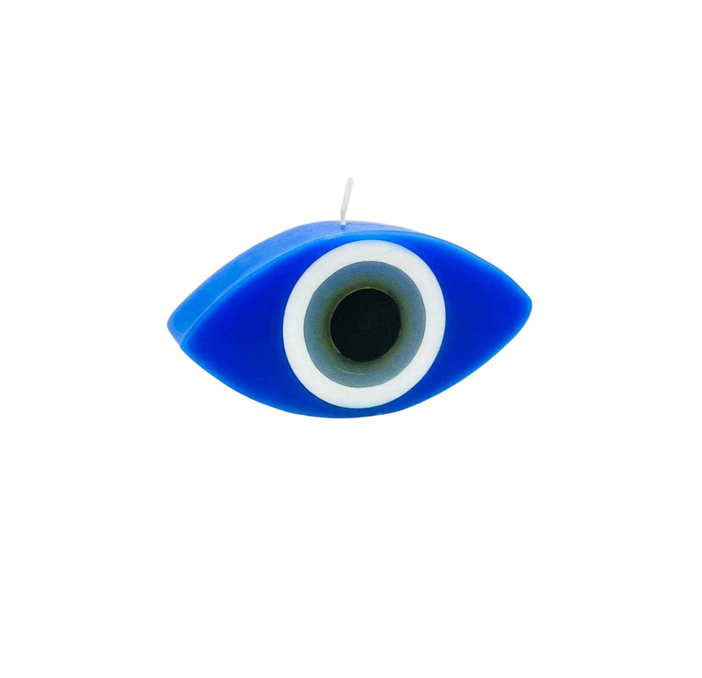 A blue evil eye candle with a white ring and black pupil detail, shown on a plain white background.
