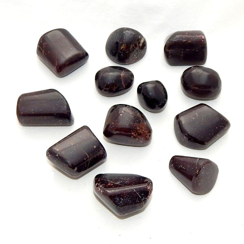 Dark brown stones on a white background