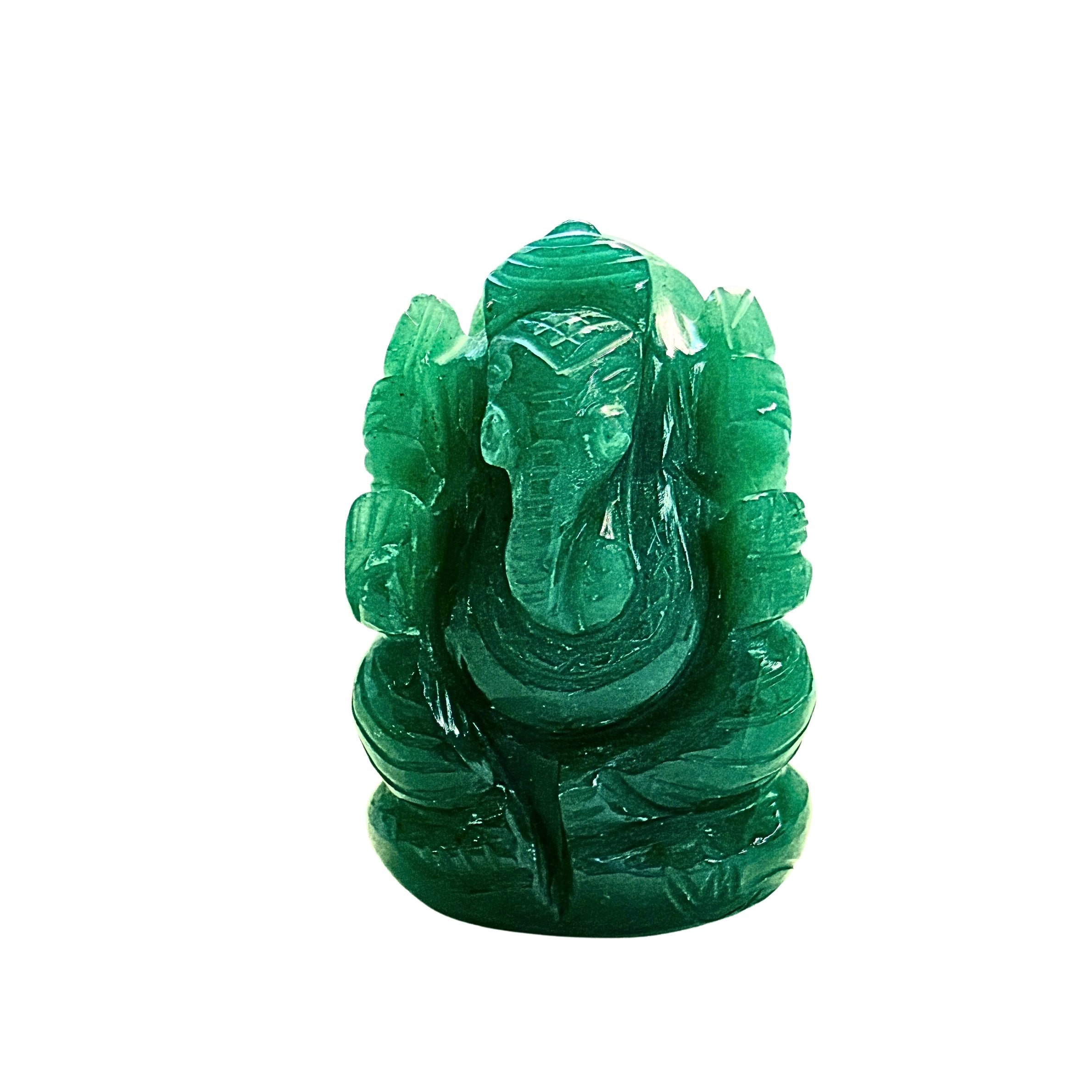 A carved green aventurine stone Ganesha figurine, shown against a plain white background.