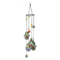 Decorative wind chime with colorful designs and hanging elements on a white background