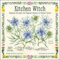 Calendar cover with floral design and text about 'Kitchen Witch' and 'Black Cumin'.