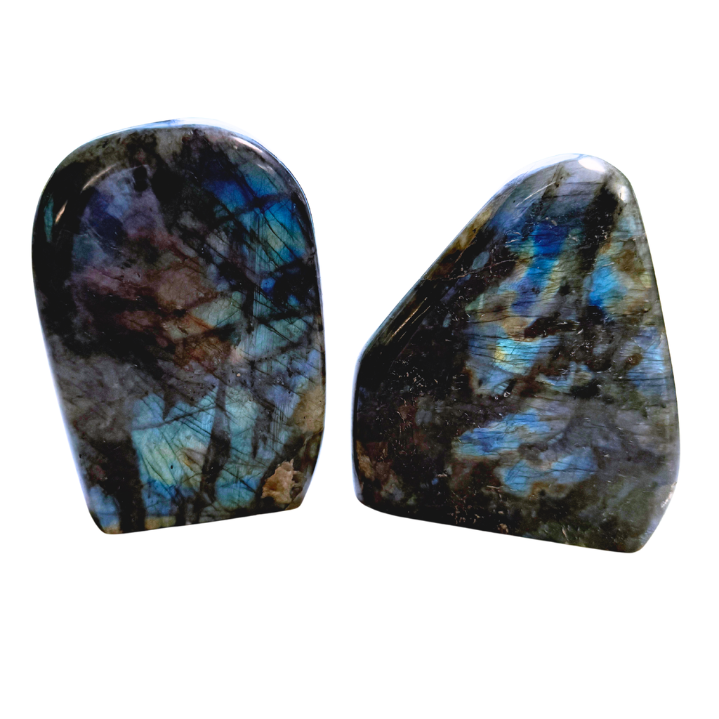 Two Labradorite Free Form Standing Stones with blue and green flash on a white background