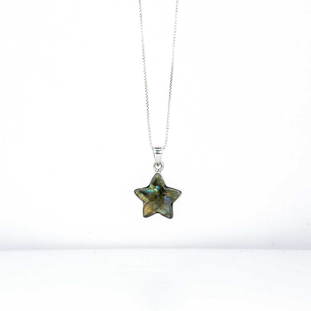 Star-shaped labradorite pendant on a silver chain against a white background