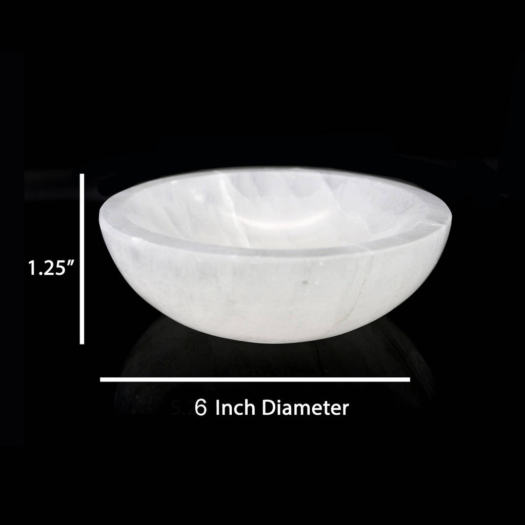 Selenite 6 inch bowl against a black background with measurements
