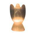 A selenite angel-shaped lamp with a lit interior, centered on a plain white background.