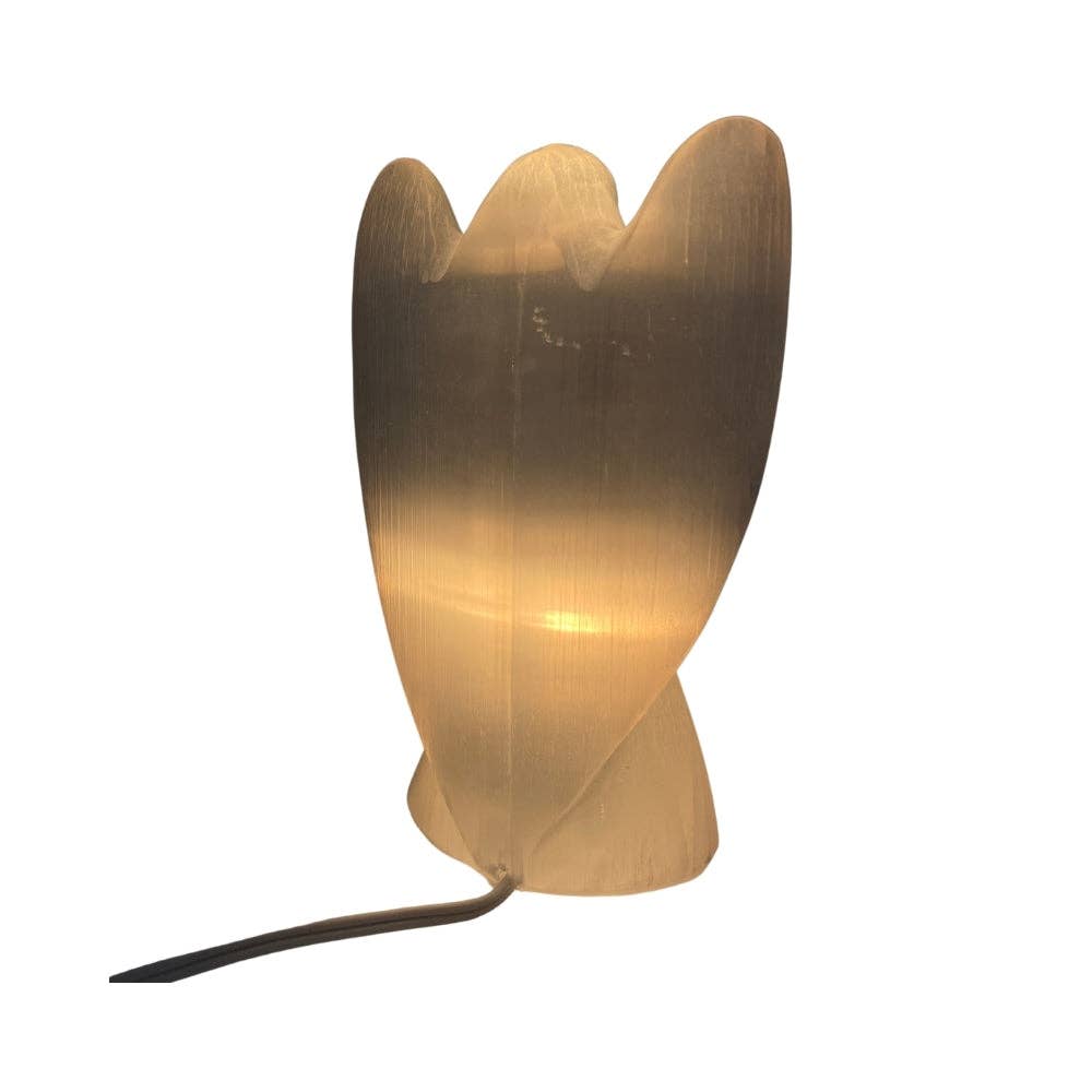 A modern selenite angel-shaped table lamp with a warm yellow glow, featuring a thin black power cord, isolated on a white background.