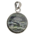 A round pendant featuring seraphinite, set in a polished sterling silver bezel with a matching bail, shown on a plain white background.
