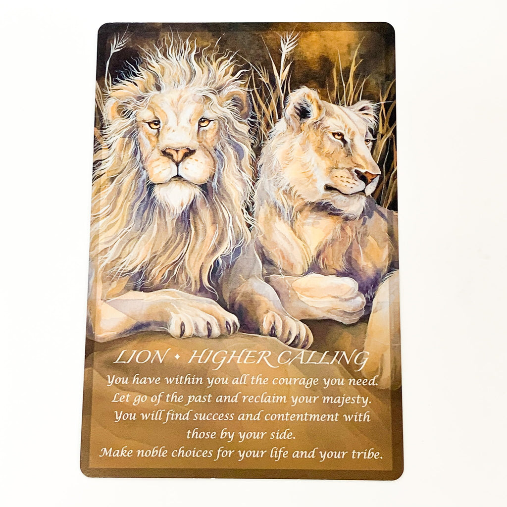 Decorative plaque with two lions and an inspirational message on a white background