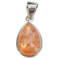 A teardrop-shaped pendant featuring a Sunstone, set in a sterling silver bezel with a matching silver bail, shown against a plain white background.