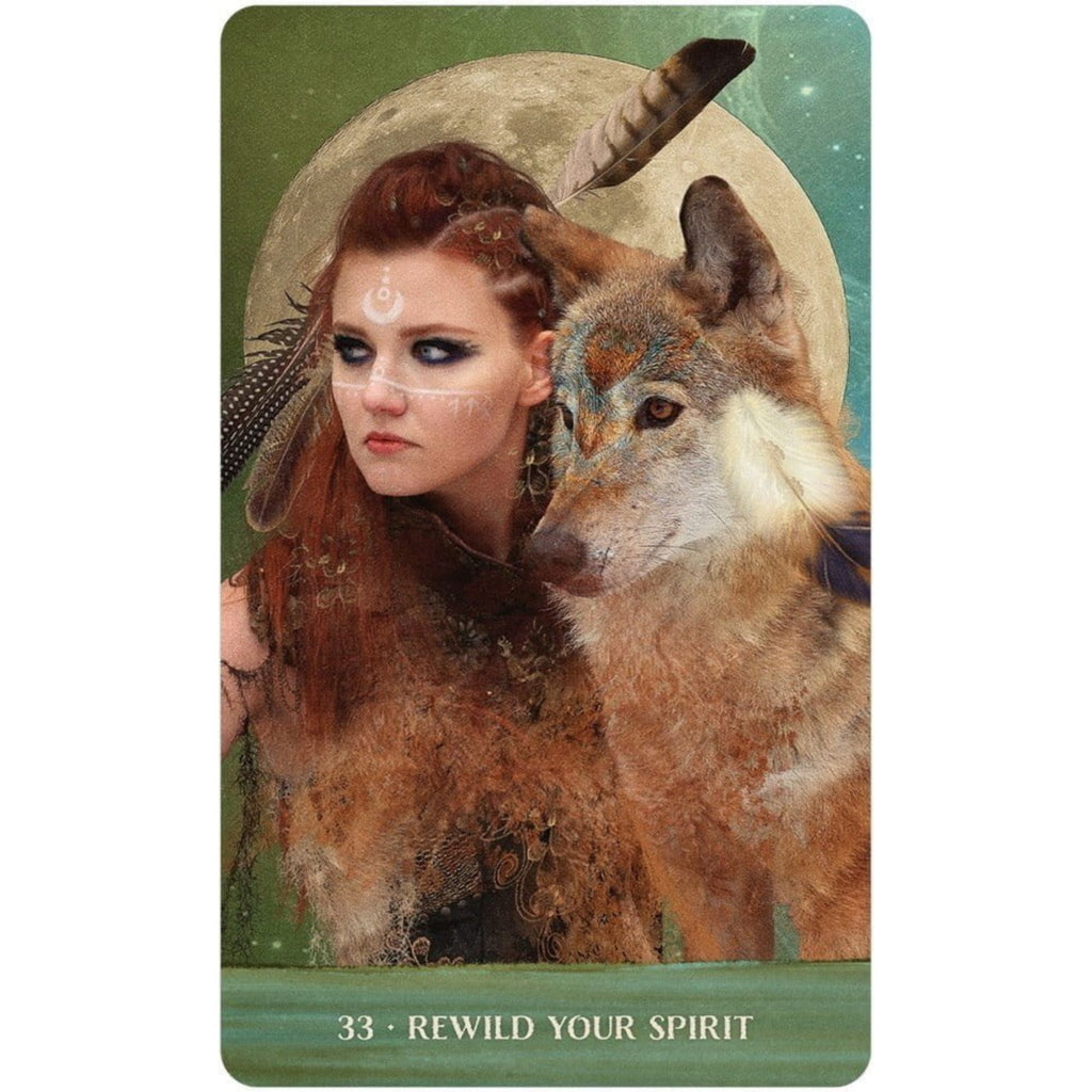 Card with a woman and wolf in front of a moon, featuring text 'Rewild Your Spirit'.