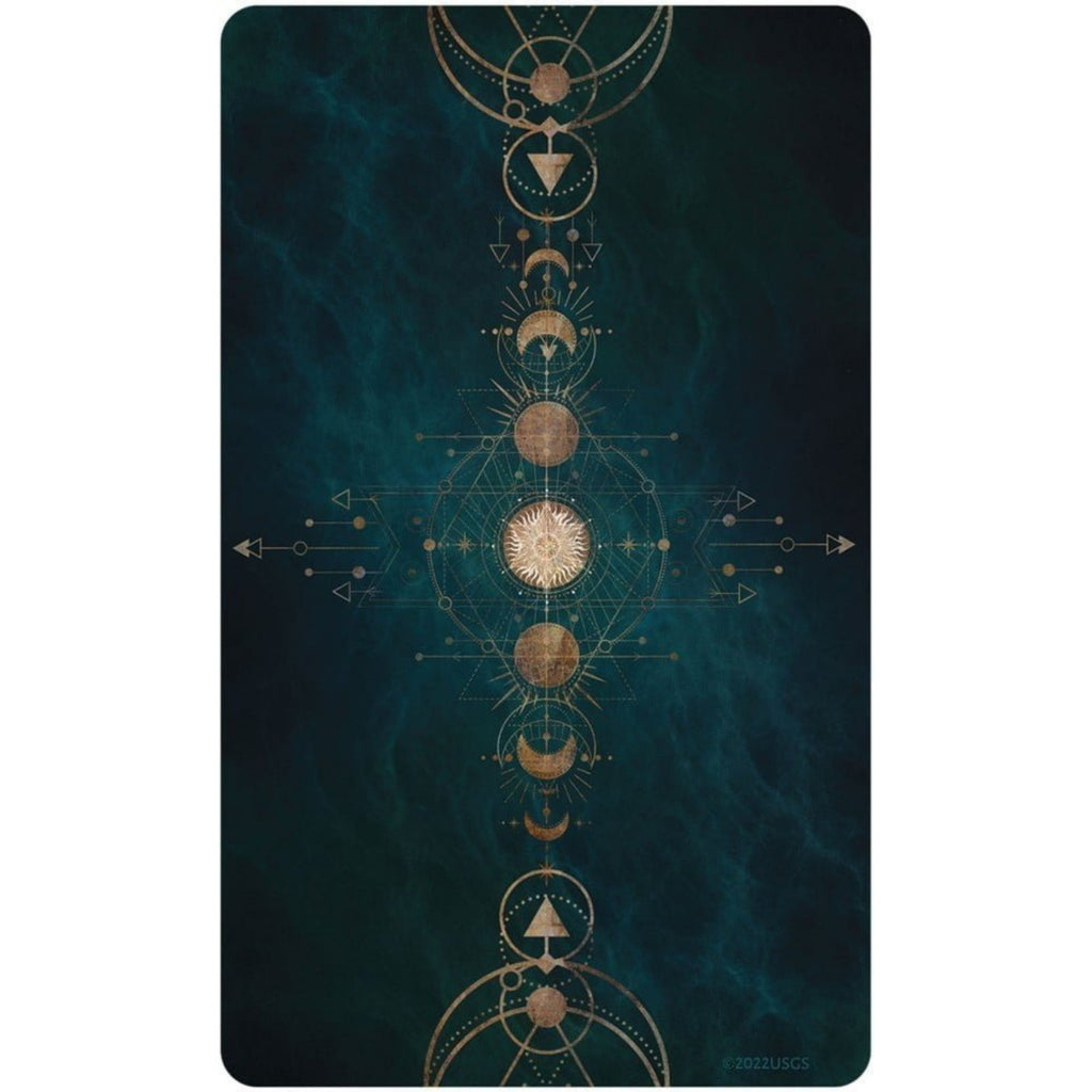 Back of card design with gold celestial design on a dark teal background