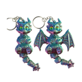Two small dragon keychains with metallic iridescent blue, green, and purple finish, shown on a plain white background.