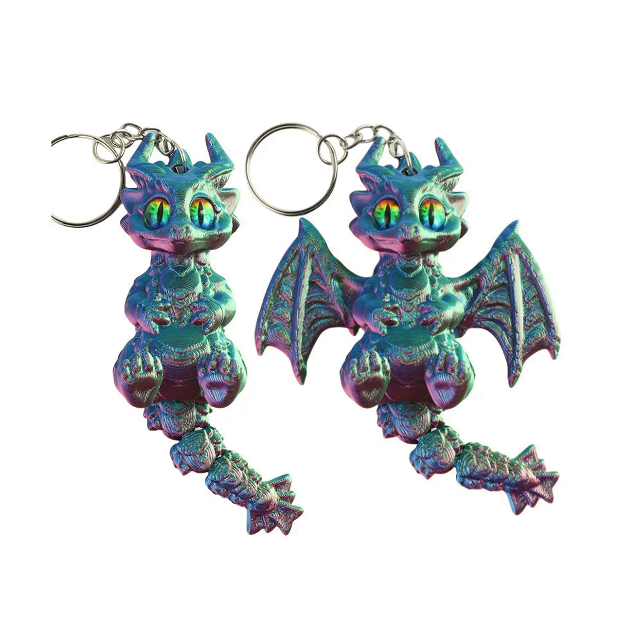 Two small dragon keychains with metallic iridescent blue, green, and purple finish, shown on a plain white background.