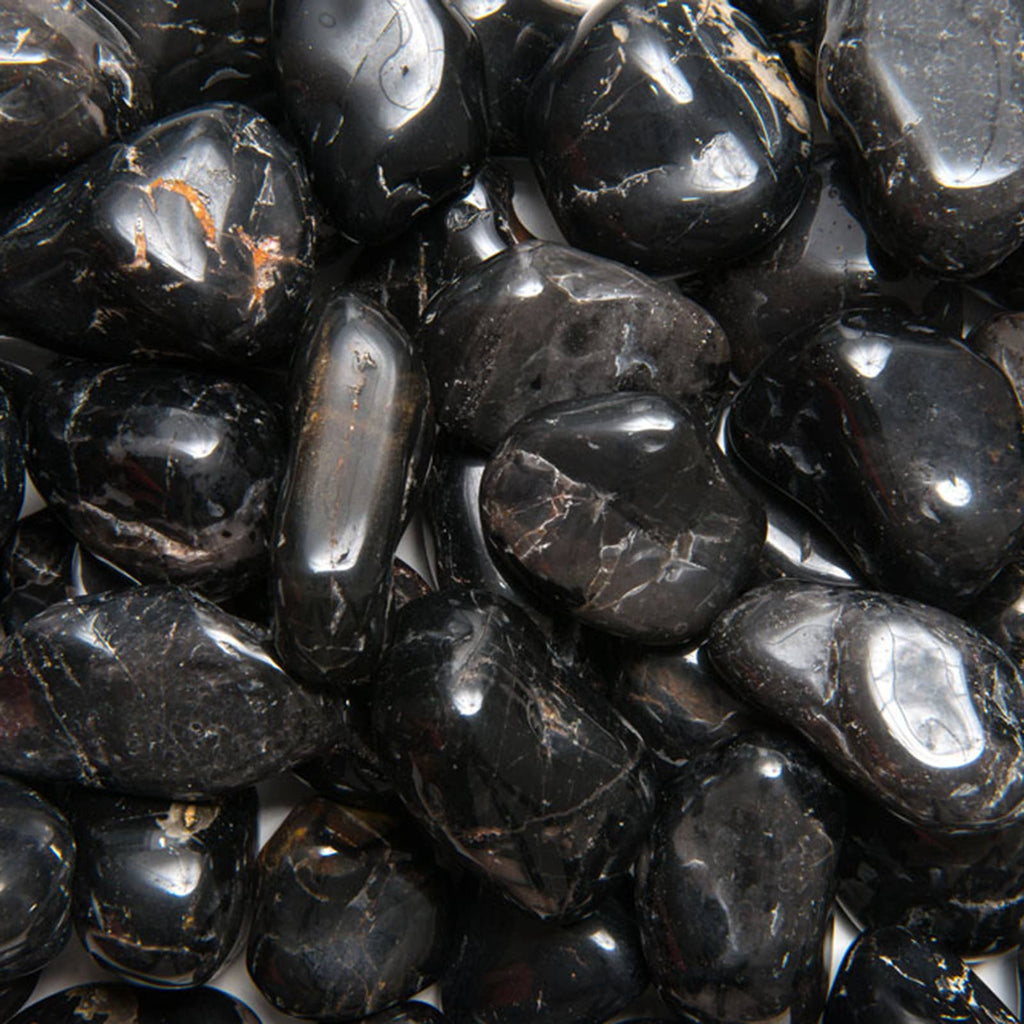 Close-up of dark polished black onyx stones