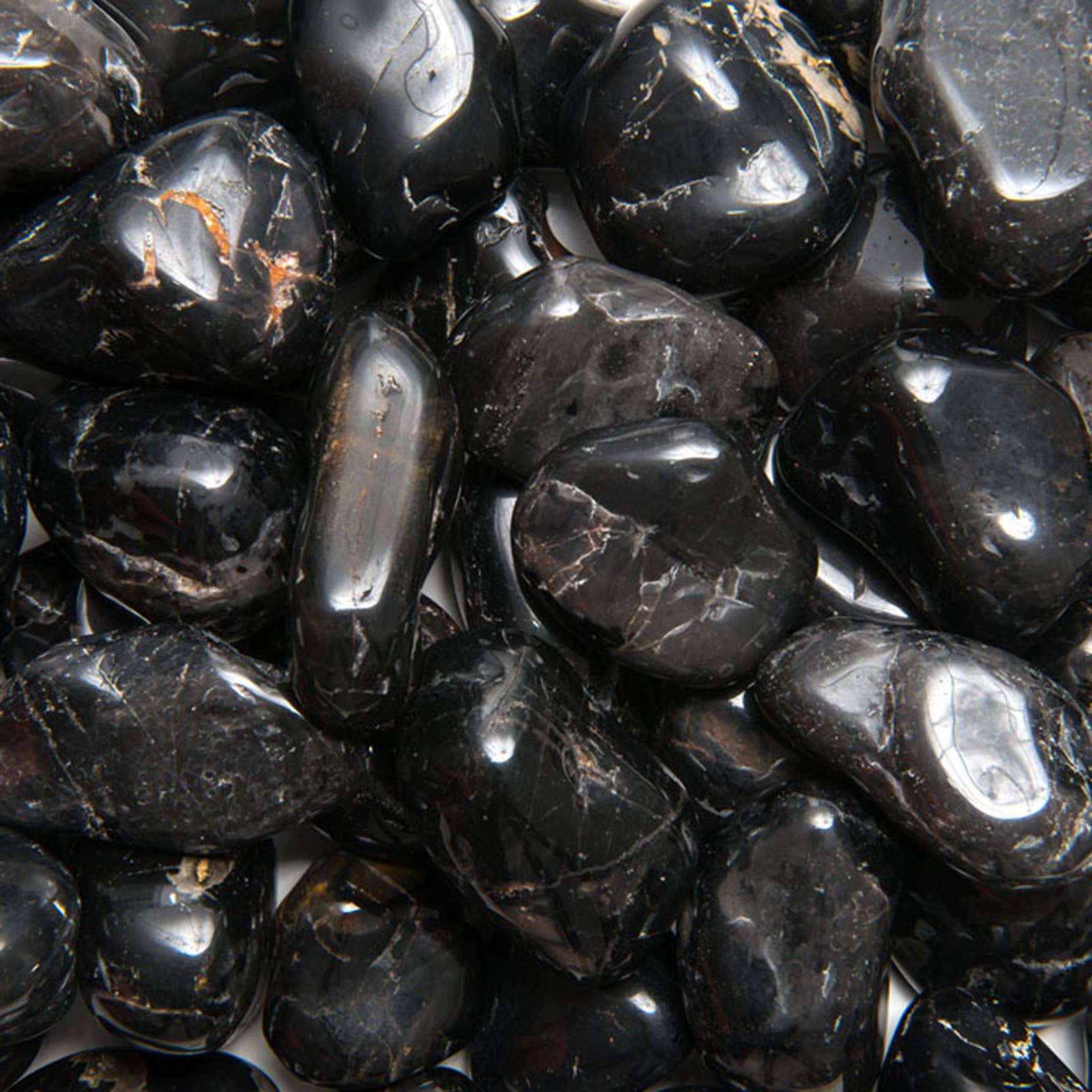 Close-up of dark polished black onyx stones