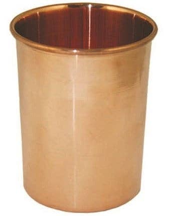 Copper cup on a white background
