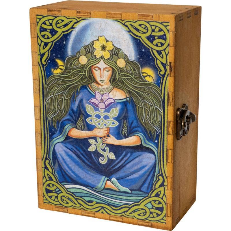 A rectangular wooden box with a hinged lid, featuring a hand-painted folk art illustration of a seated female figure in a blue robe with green hair and a yellow flower crown, framed by Celtic knot borders. The box is made of light brown wood and has a metal latch on the side.
