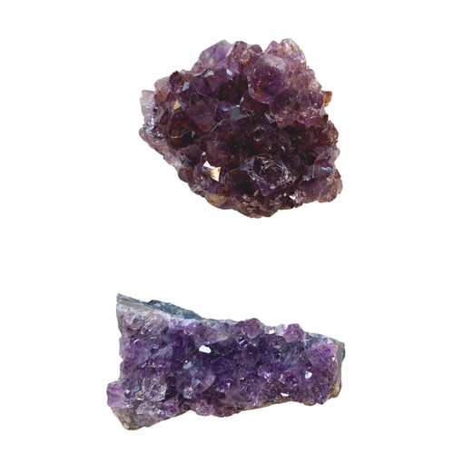Two purple crystal formations on a white background