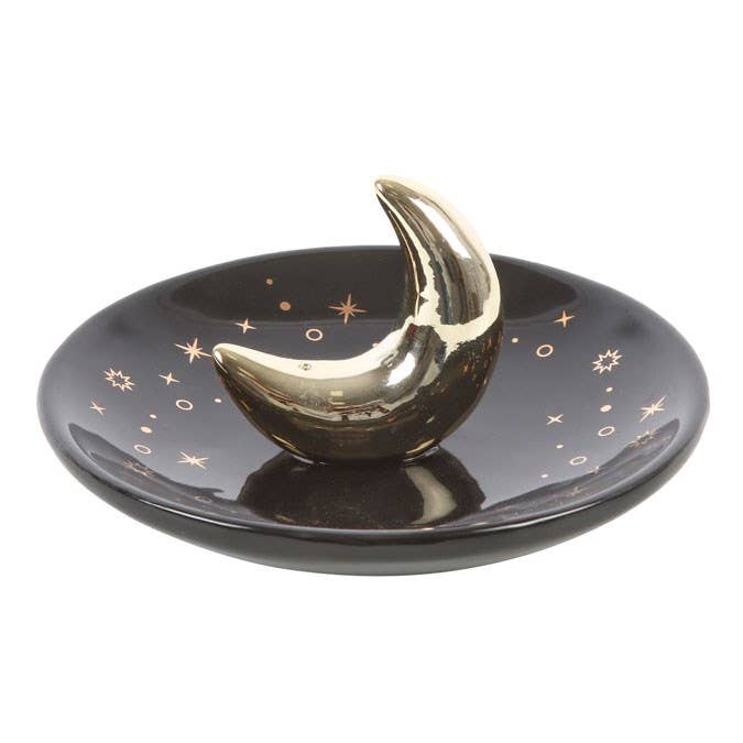 Black dish with a gold crescent moon on a white background