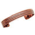 Copper bracelet with braided design on a white background