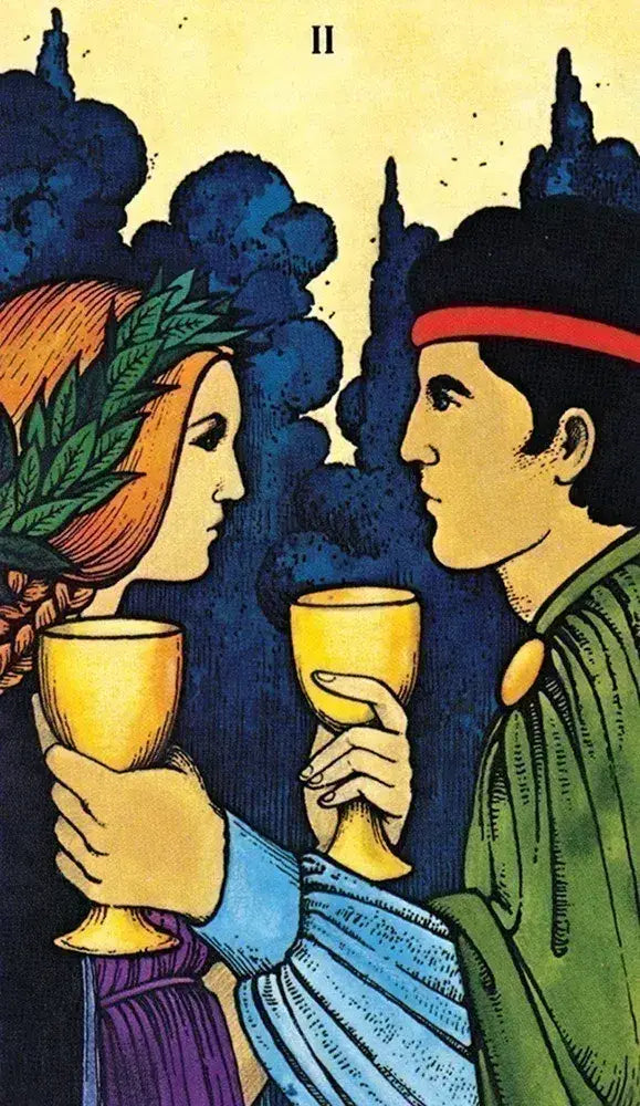 Tarot card with two people holding cups against a dark background