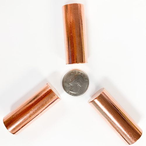 Copper Harmonizers with quarter for scale