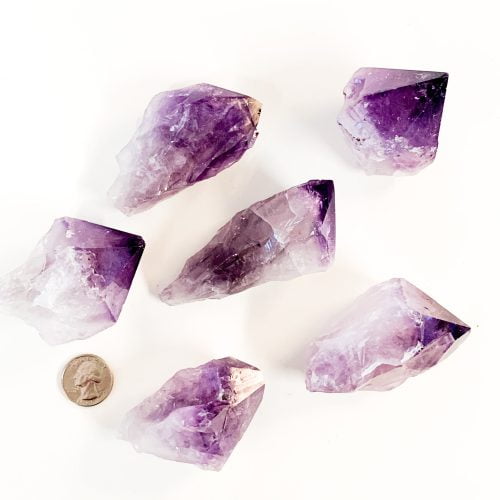 Amethyst Points with Quarter for Scale