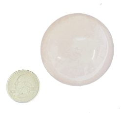 Pink Calcite Sphere with Quarter