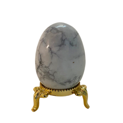gold finish ring stand with howlite egg