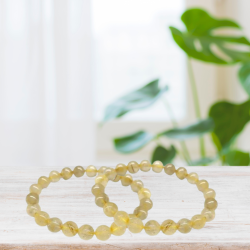 Rutilated Quartz Bracelet 8mm on table